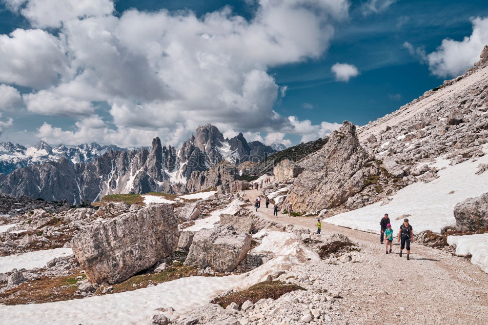 Similar – Hiking trail with hiker with panoramic view in the Dolomites