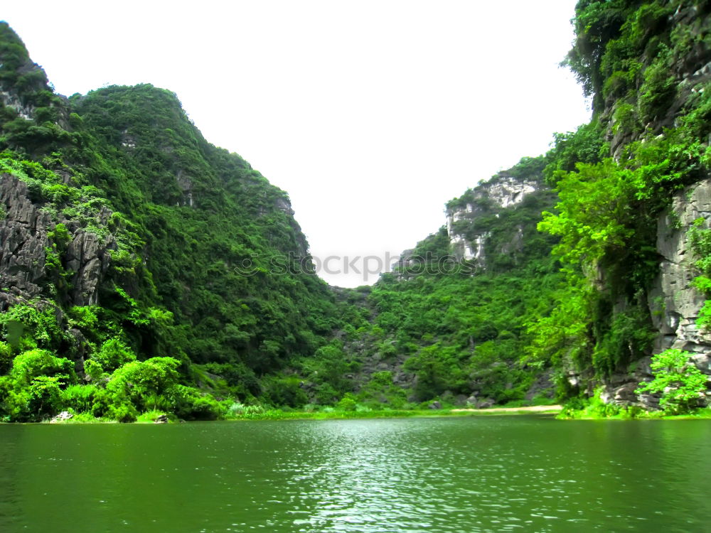 Similar – Landscape Vietnam. River view in the dim light of dusk at Ninhbi