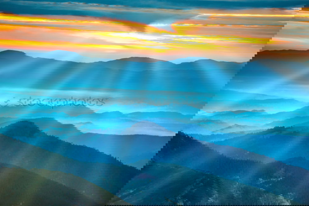 Similar – Image, Stock Photo Dramatic sunset in the mountains
