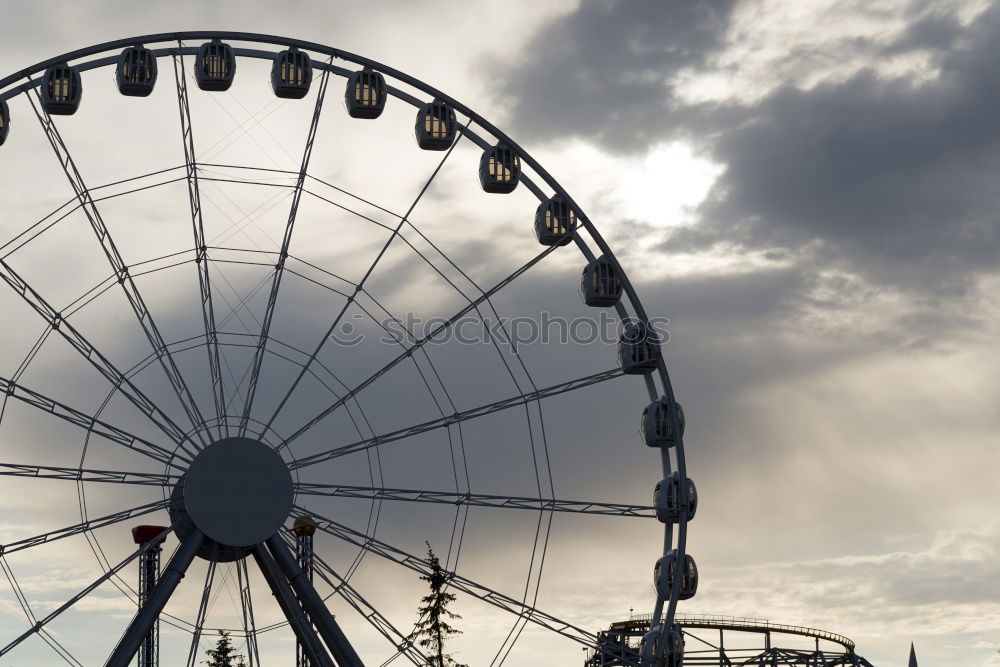 Similar – Der Blick hinauf zu einem Riesenrad mit blauem Himmel dahinter.