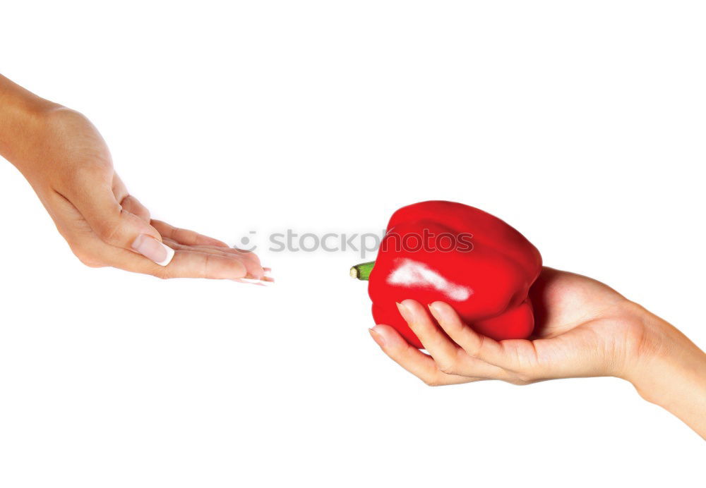 Similar – hands holding two oranges on gray background