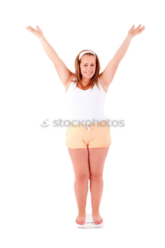 Similar – young redhead woman with curls and freckles stands barefoot in hot pants in front of white door and smiles