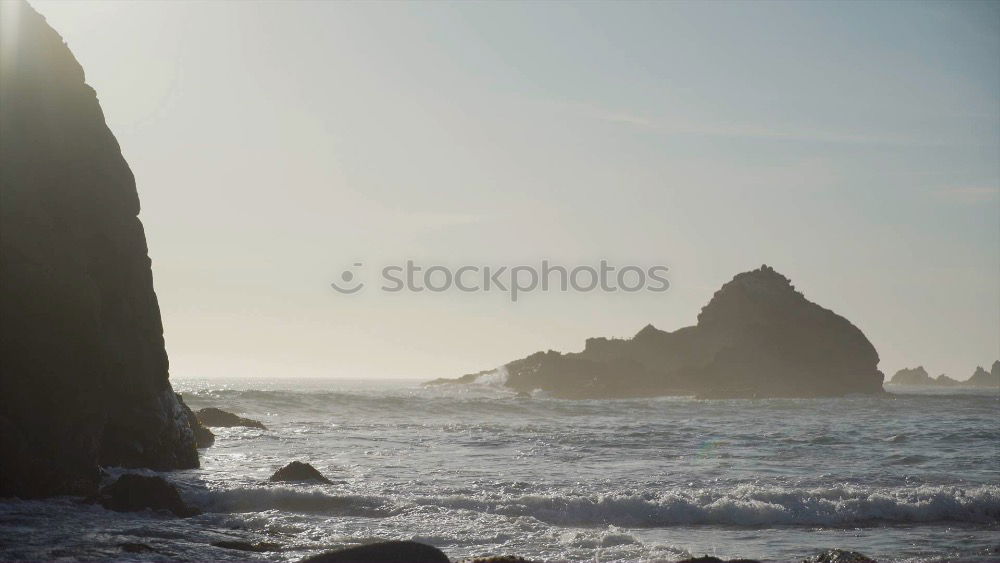 Similar – Image, Stock Photo Big chunk. Huge rock lies in the Pacific surf. Queensland. Australia. In the background very small : skyscrapers.