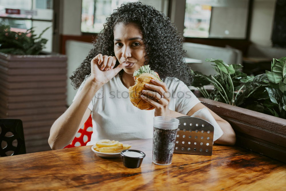 Similar – Young woman in casual clothes drinking a soda.