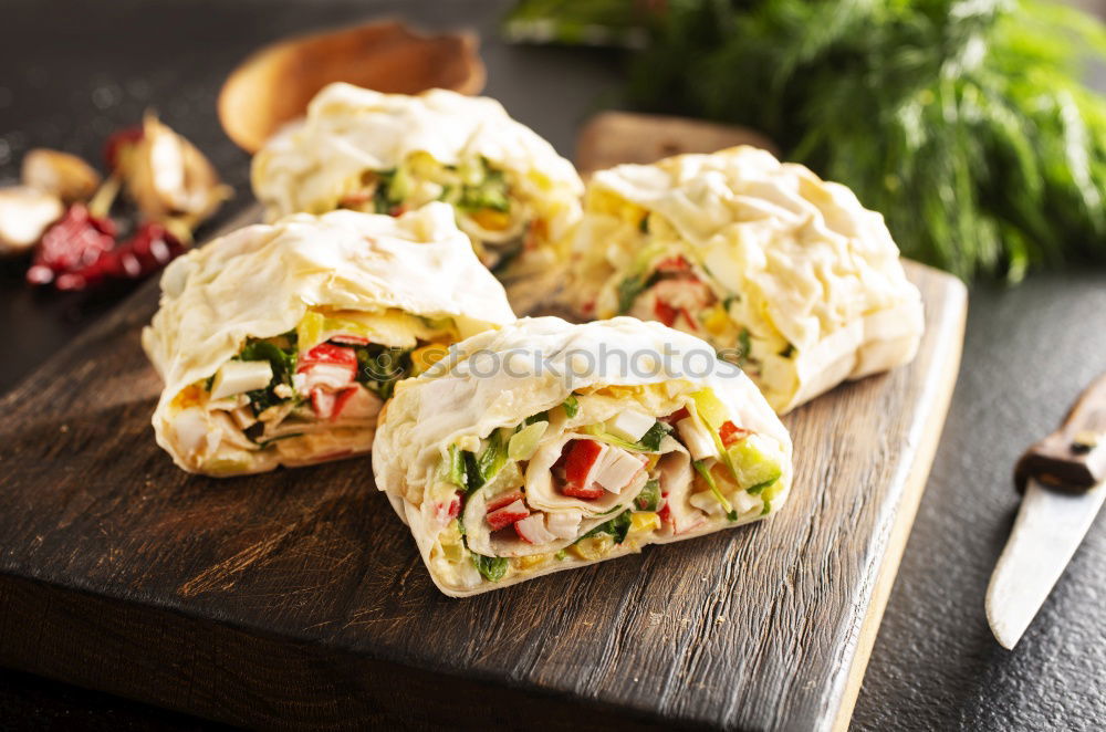 Similar – Image, Stock Photo Mediterranean goat cheese baked in parchment paper