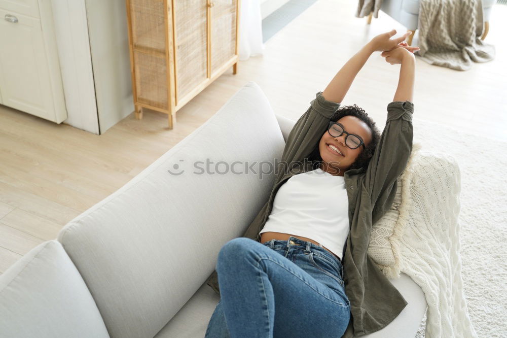 Similar – Image, Stock Photo Young woman sitting and resting on bed