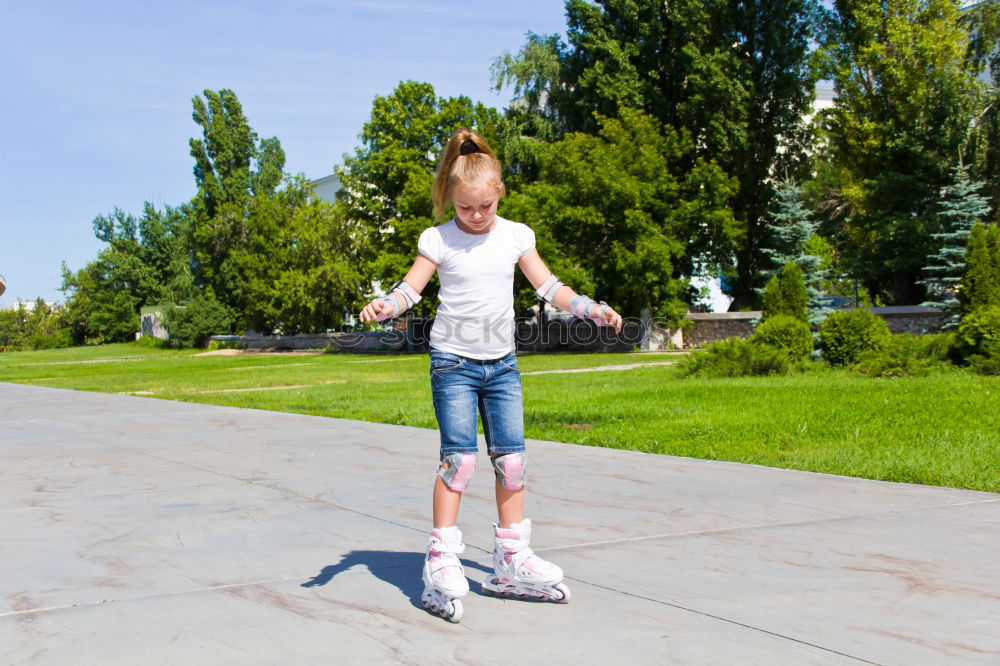 Similar – Image, Stock Photo Slim young woman enjoys inline skating