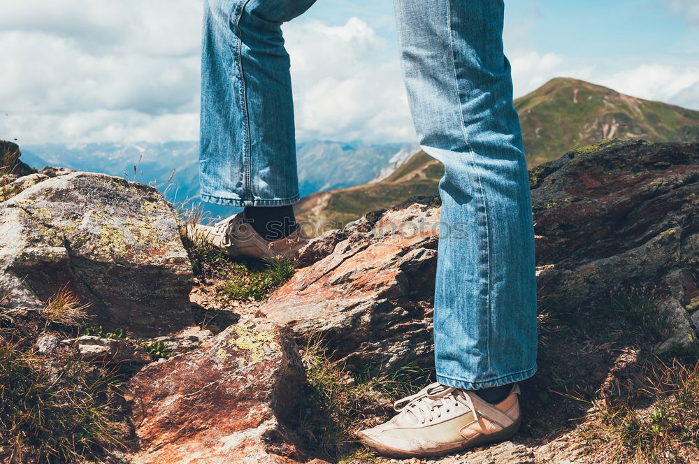 Similar – Image, Stock Photo Legs of tourist on edge