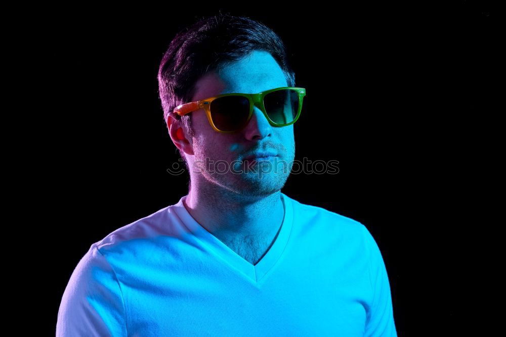 Image, Stock Photo Young handsome man over a dark brick wall