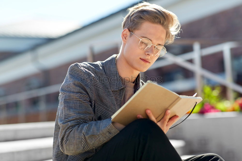 Similar – Image, Stock Photo young boy looking at tablet pc computer with frustrated look on his face