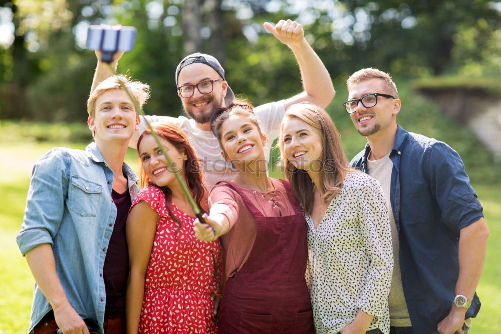 Similar – Group of young people together outdoors in urban park