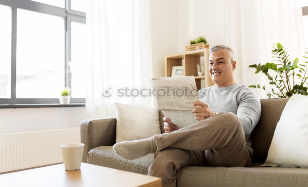 Image, Stock Photo Smiling woman lying on table