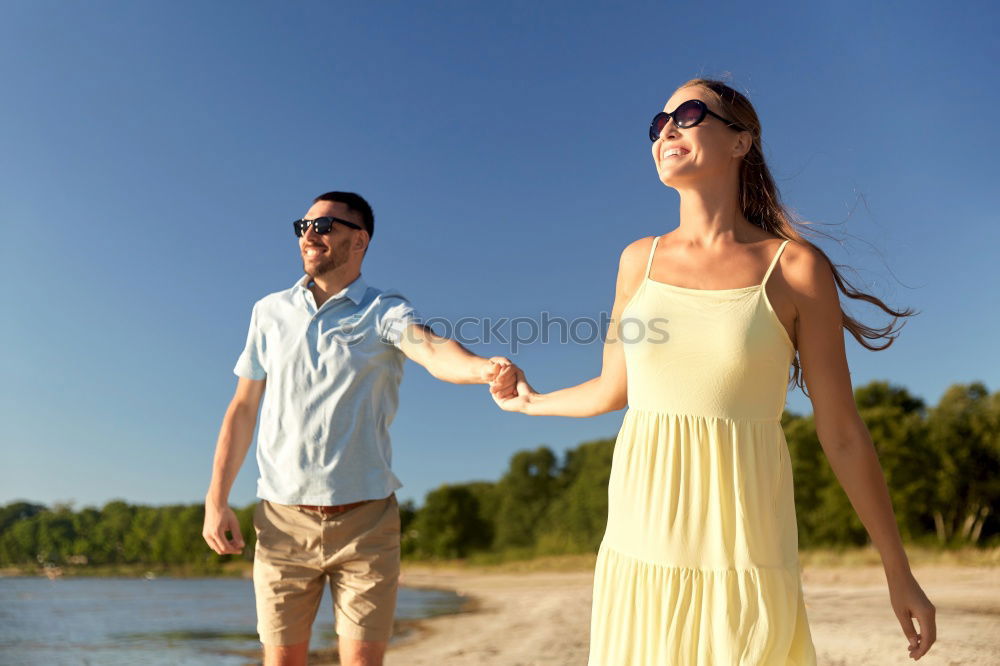 Similar – Happy family walking on the beach at the day time.