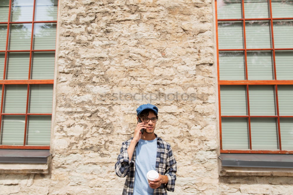 Similar – Afro young man using mobile phone and fixed gear bicycle.