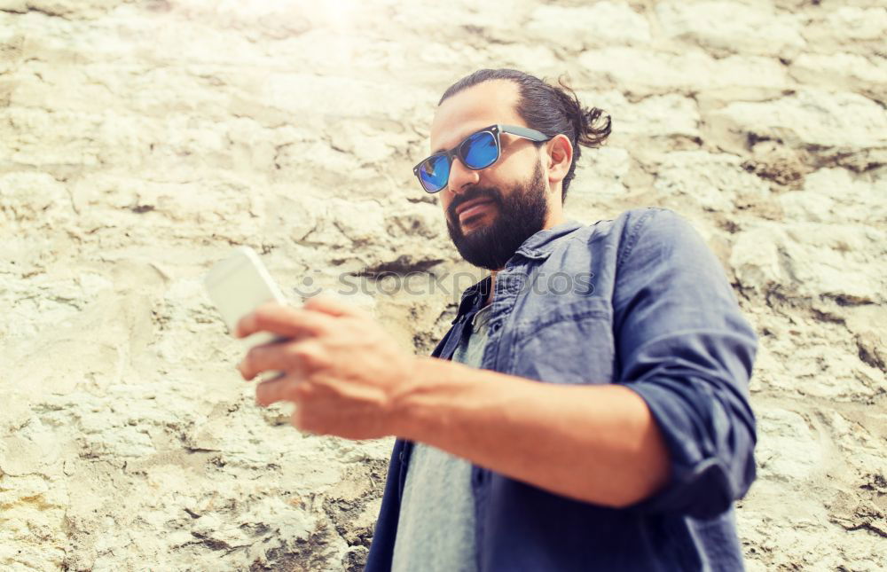 Similar – Man with beard and sunglasses