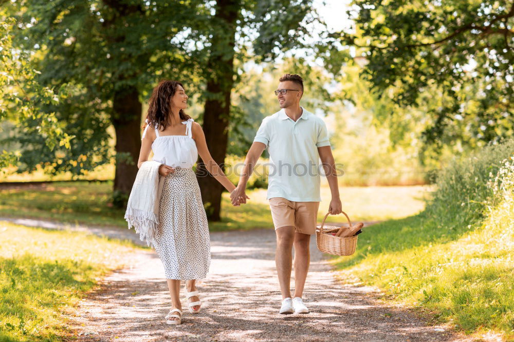 Similar – Lesbian couple with child in park