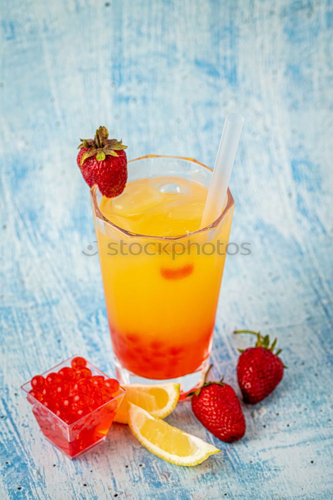 Similar – Image, Stock Photo Summer refreshment with orange and strawberries