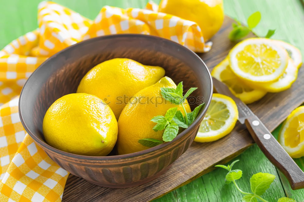 Similar – Image, Stock Photo ripe yellow whole lemons and lime