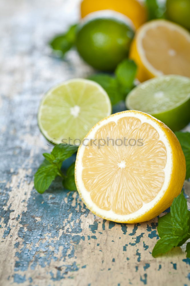 Similar – Image, Stock Photo ripe yellow lemons and lime, mint green