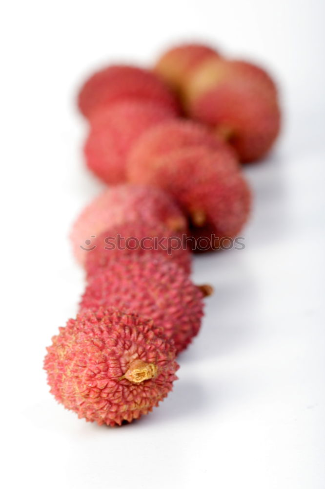 Similar – fresh tropical rambutan fruits over rustic wood table