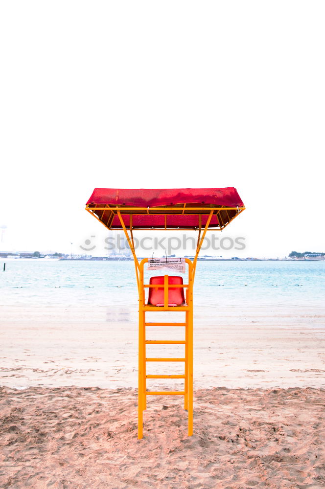 Similar – colorful Pedalos on the beach sand