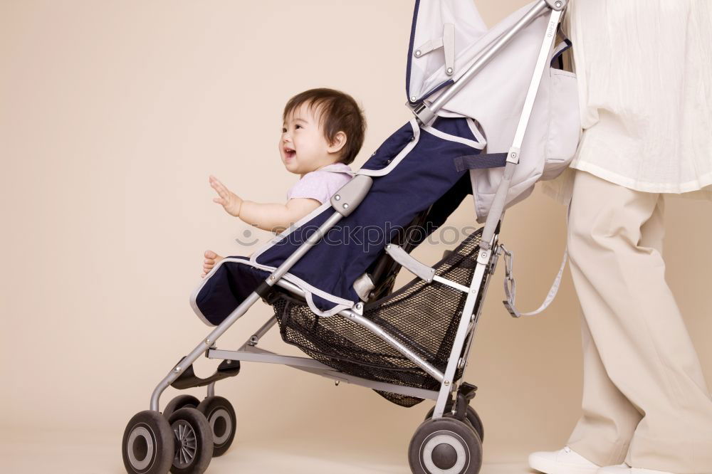 Image, Stock Photo An old doll’s pram recalls childhood in the seventies full of sadness and desolation