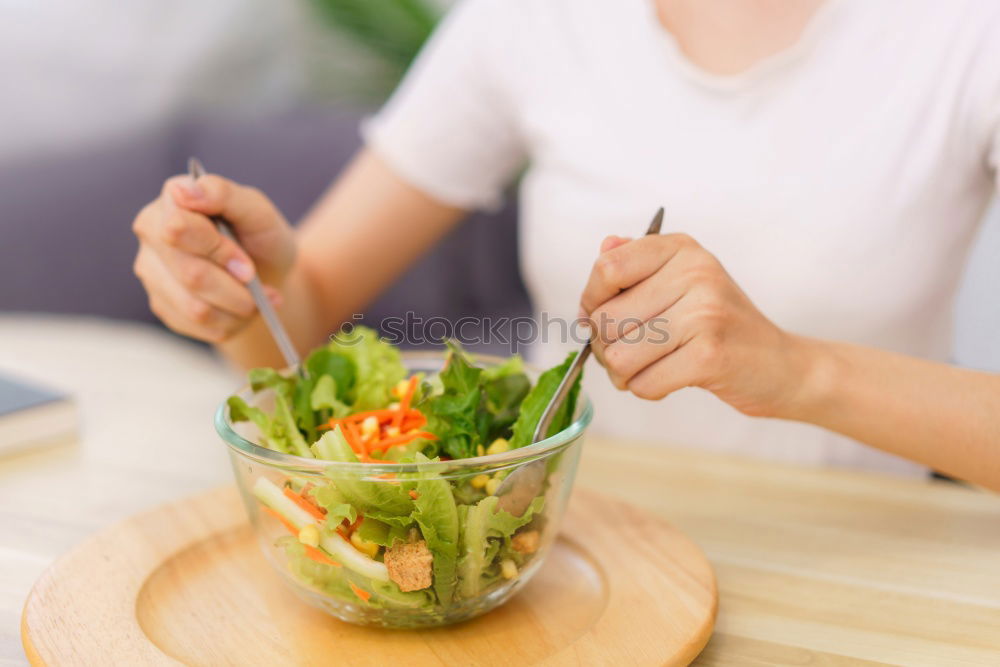 Similar – Image, Stock Photo Woman eating quinoa and vegetables in bowl