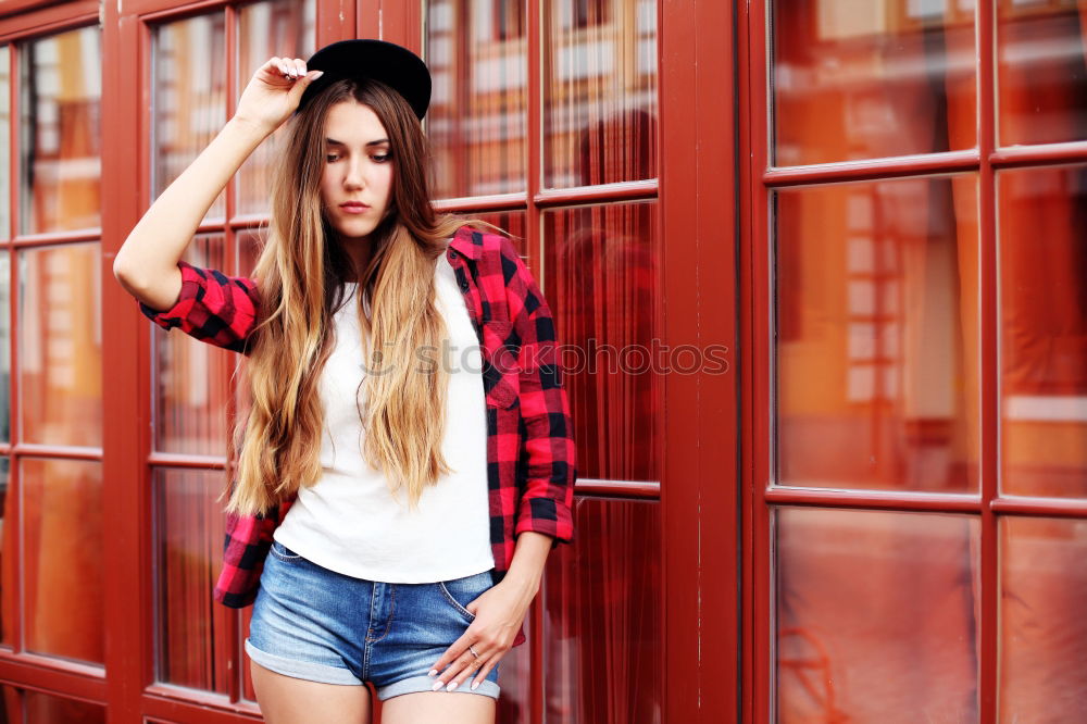 Similar – Young sexy woman against red background