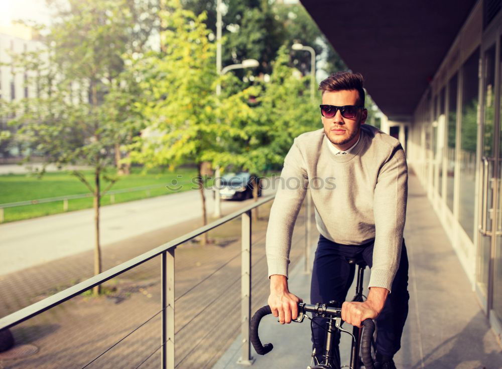 Attractive man in winter fashion checking his mobile