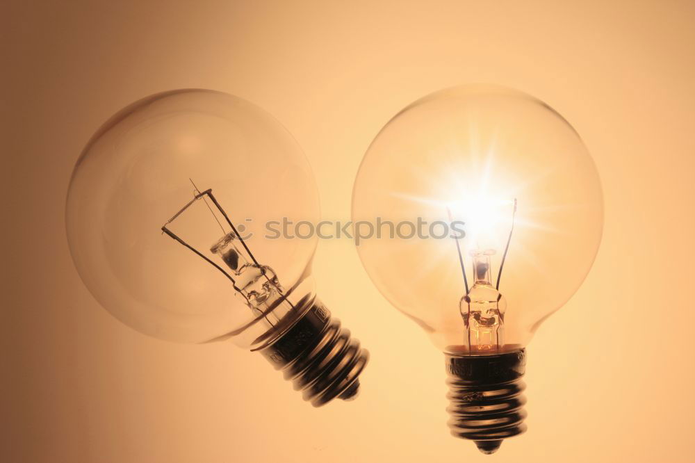 Similar – Orange-coloured LED lights in a row in incandescent optics, shallow depth of field