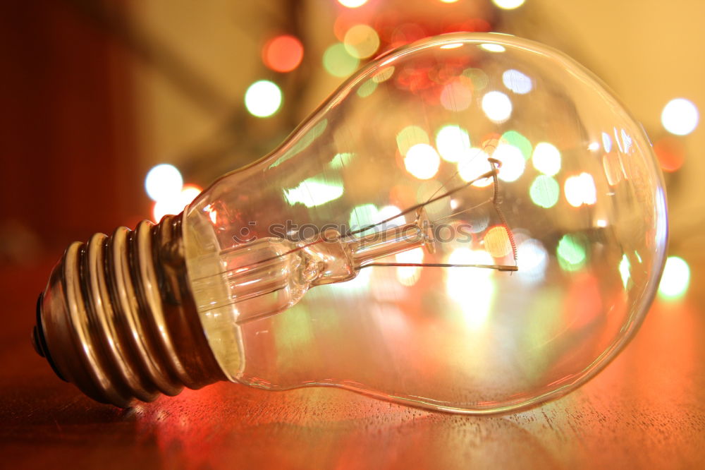 Similar – Orange-coloured LED lights in a row in incandescent optics, shallow depth of field