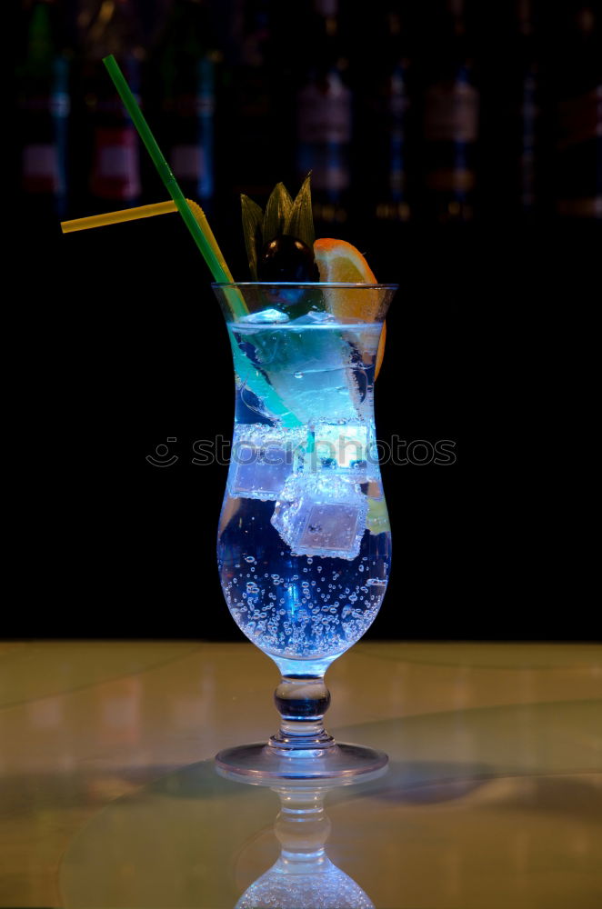 Similar – Image, Stock Photo Barman pouring a cocktail into a glass