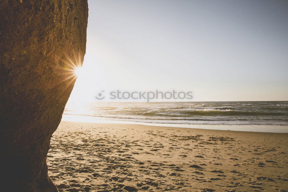 Similar – Kind umarmt Hund am Meer