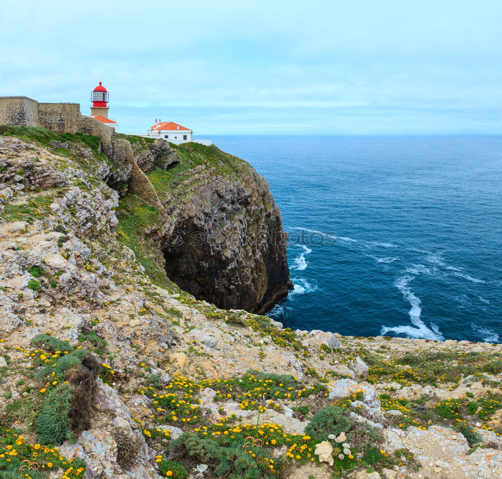 Similar – Lighthouse on cliff at Cabo São Vincente near Sagres in Portugal.