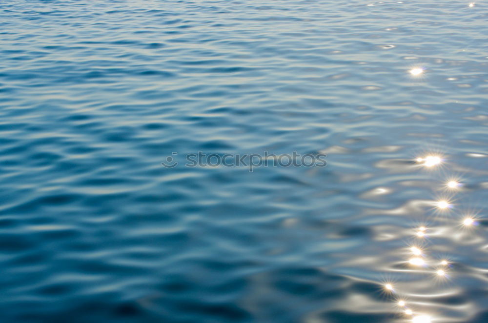 Similar – Ripple of blue water