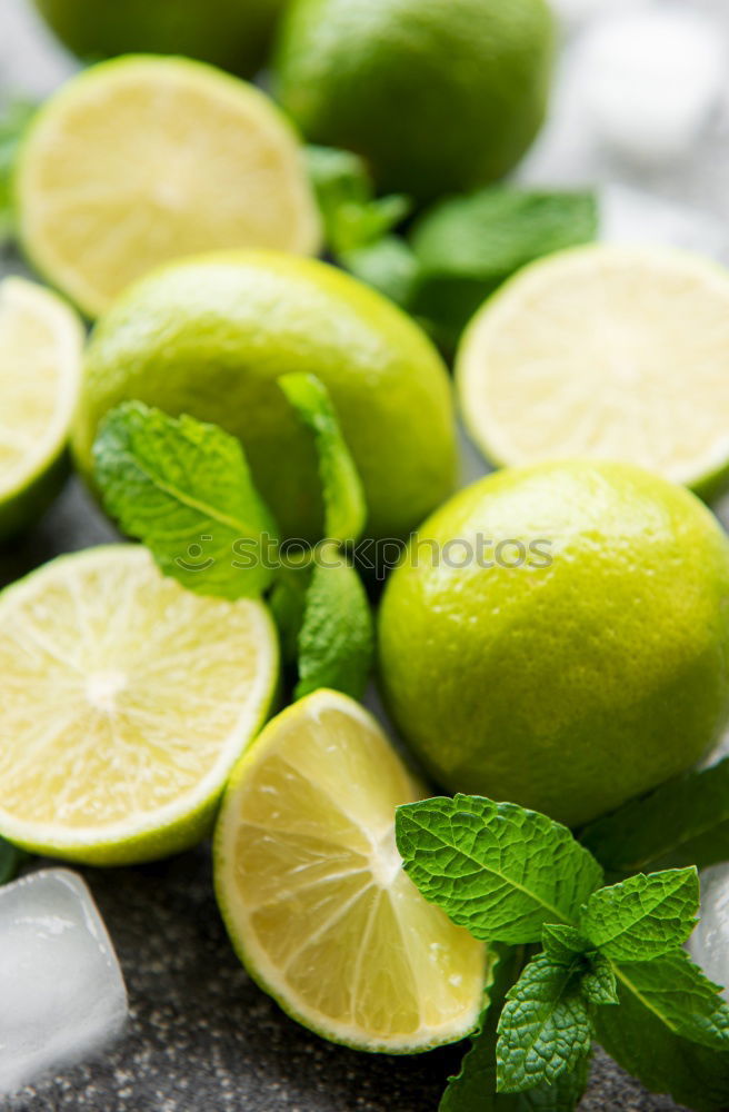 Similar – Image, Stock Photo ripe yellow lemons and lime, mint green