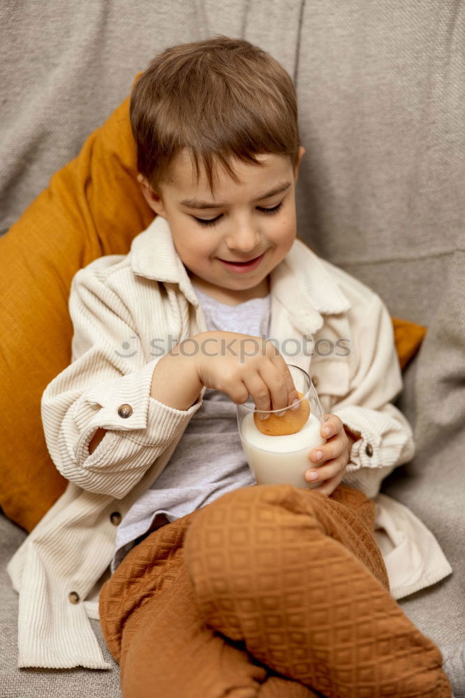 Similar – Funny boy smiling sitting inside a suitcase