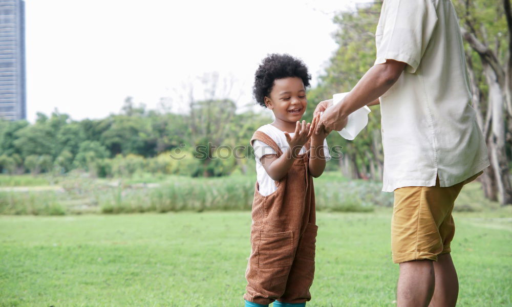 Similar – Image, Stock Photo Smiling little child with smart phone taking picture of happy grandmother and grandfather. Family leisure outdoor