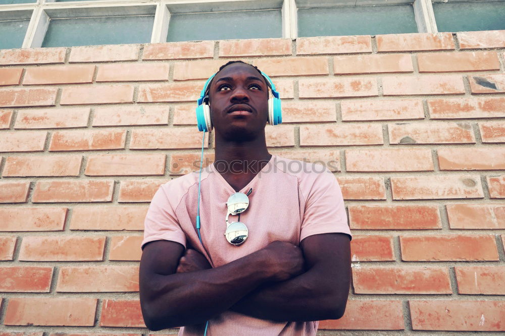 Similar – Image, Stock Photo Young black man wearing casual clothes and sunglasses outdoors