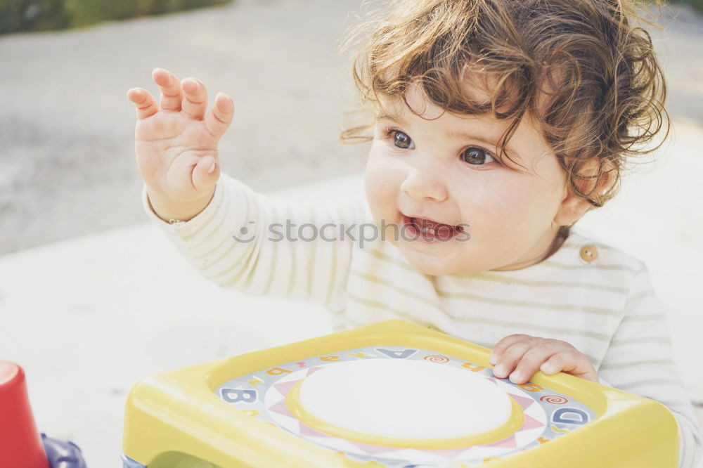 Similar – Happy baby playing with toy blocks.