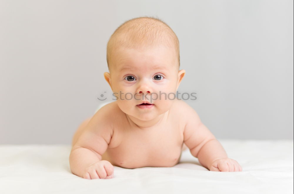 Similar – Cute Baby Girl Lying in the Crib