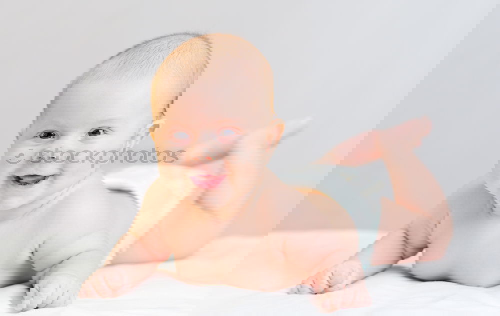 Similar – Image, Stock Photo Portrait of newborn baby lying down over a blanket