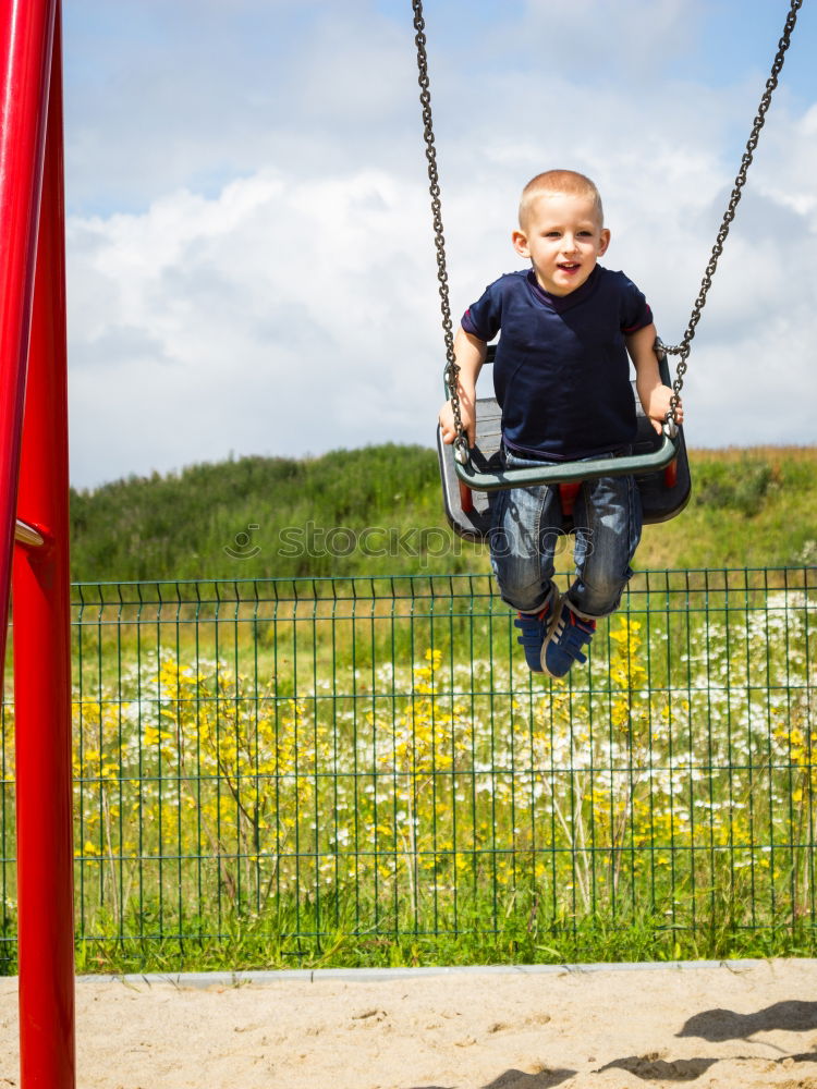 Similar – Child on a slide Joy