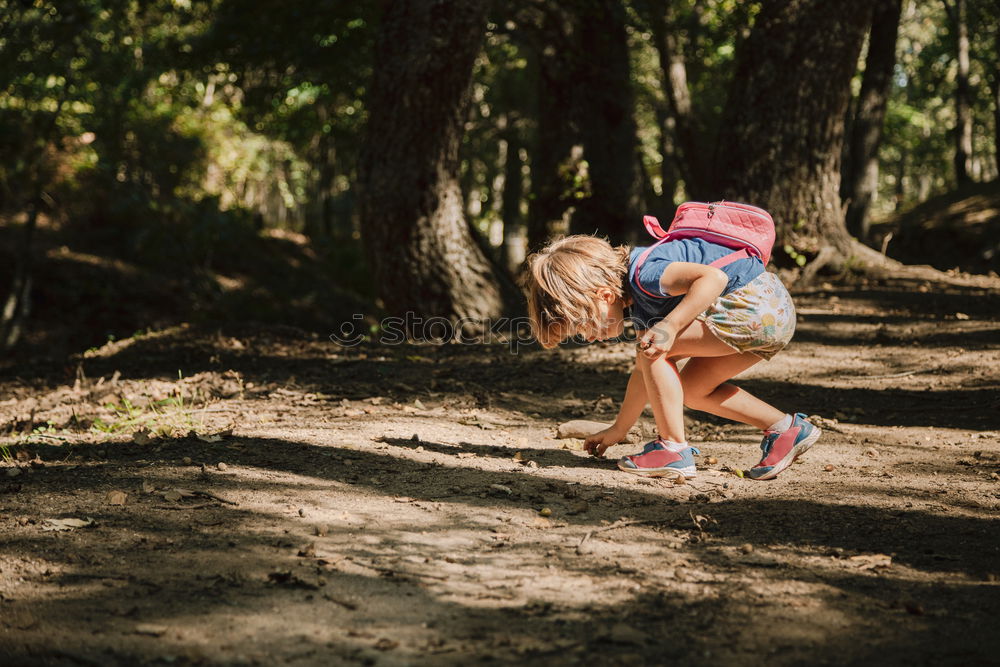 Similar – Image, Stock Photo Cheerful kid in costume posing on tree