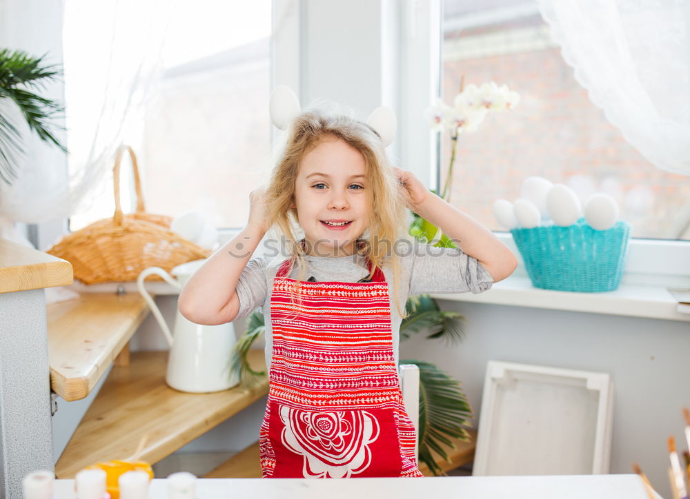 Similar – Boy in cook hat in kitchen