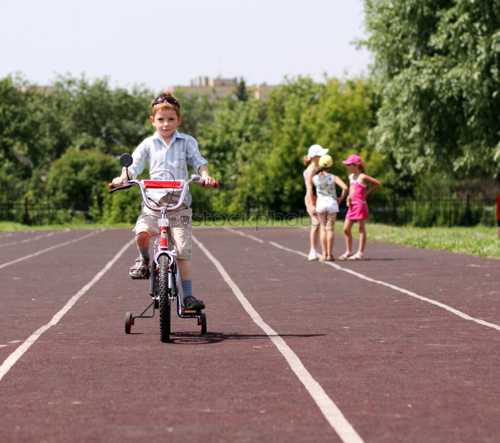 Similar – Junge fährt mit dem Fahrrad zur Rampe