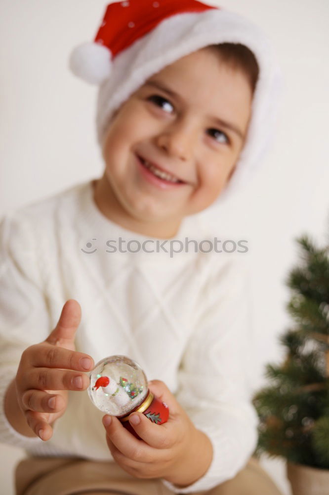 Similar – Image, Stock Photo Little kid decorating Christmas biscuits at Christmas day