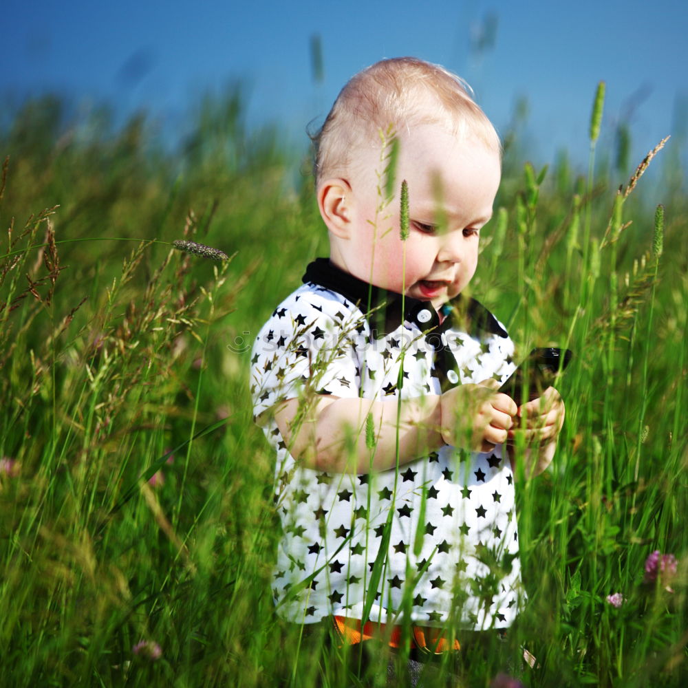 Similar – Image, Stock Photo child on gravel with fur cap … what else …