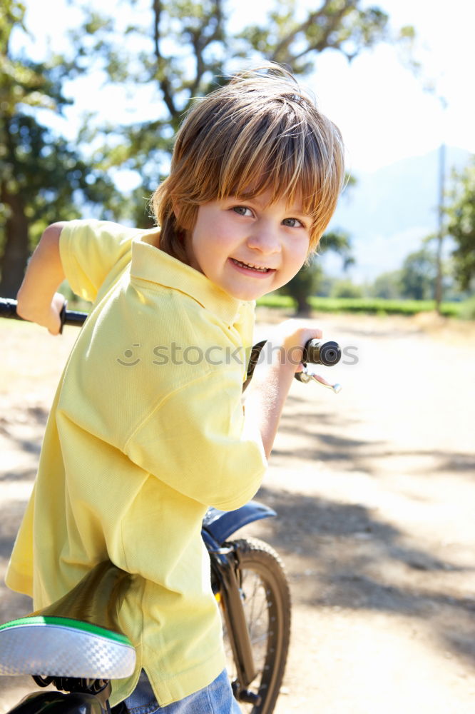 Similar – Image, Stock Photo happy child on a bicycle