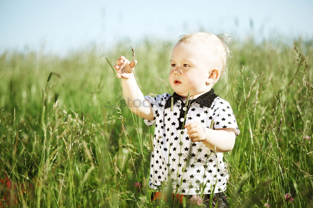 Similar – Baby raising arms arms up